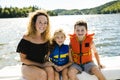 Family out boating together having fun on vacancy Royalty Free Stock Photo