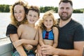 Family out boating together having fun on vacancy Royalty Free Stock Photo