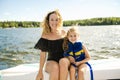 Family out boating together having fun on vacancy Royalty Free Stock Photo