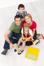 Family with paint preparing to redecorate their home