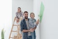 Family painting a room together