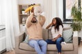 African family playing with baby daughter at home Royalty Free Stock Photo