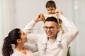 Happy family and baby daughter playing at home Royalty Free Stock Photo