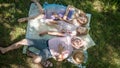 Family in park at picnic - father, mother and daughter - top view Royalty Free Stock Photo