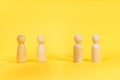 Family people figures on yellow background. Concept of family, values, unity, togetherness Royalty Free Stock Photo