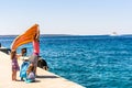 Family and people waiting at turist passenger ferry boat. Royalty Free Stock Photo