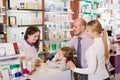 Family in the pharmacy Royalty Free Stock Photo