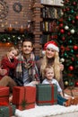 Family photo in Christmas room