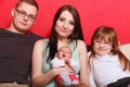 Family photo of mother, baby, daughter and father Royalty Free Stock Photo