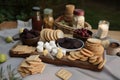 family picnic with fire pit and s'mores ingredients for sweet treat