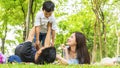 Family Picnic at gaden park Outdoors Togetherness Relaxation Concept with father carrying the kid Royalty Free Stock Photo