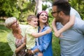 Family picnic outdoors togetherness relaxation happiness concept Royalty Free Stock Photo