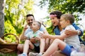 Family picnic outdoors togetherness relaxation happiness concept Royalty Free Stock Photo