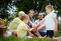 Family picnic outdoors togetherness relaxation happiness concept Royalty Free Stock Photo