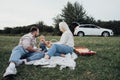 Family Picnic Time, Young Parents with Their Little Daughter Enjoying Weekend Outdoors, Road Trip on the SUV Car Royalty Free Stock Photo