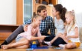 Family play at lotto game Royalty Free Stock Photo