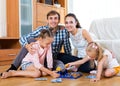 Family play at lotto game Royalty Free Stock Photo