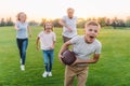 Family playing american football Royalty Free Stock Photo