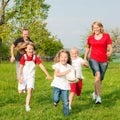 Family playing ballgames Royalty Free Stock Photo