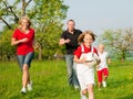 Family playing ballgames Royalty Free Stock Photo