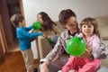 Family of Playing with Balloons Royalty Free Stock Photo