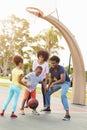 Family Playing Basketball Together