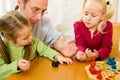 Family playing a board game