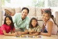 Family Playing Board Game At Home Royalty Free Stock Photo