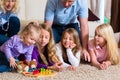 Family playing board game at home Royalty Free Stock Photo