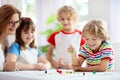 Family playing board game. Kids play Royalty Free Stock Photo