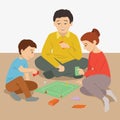 The family is playing a board game while sitting on the floor. Stay home. Taking care of yourself. Quarantine. Happy friendly Royalty Free Stock Photo