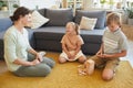 Family Playing Board Games with Special Needs Girl