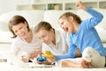 Family playing computer games Royalty Free Stock Photo