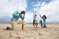 Family playing cricket on beach Royalty Free Stock Photo