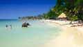 Family playing with elephant on the beach Koh Chang island Royalty Free Stock Photo