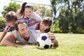 Family Playing Football In Garden Together Royalty Free Stock Photo