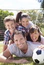 Family Playing Football In Garden Together Royalty Free Stock Photo