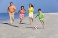 Family Playing Football Soccer on Beach Royalty Free Stock Photo