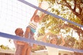 Family Playing Game Of Volleyball In Garden Royalty Free Stock Photo