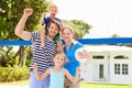 Family Playing Game Of Volleyball In Garden Royalty Free Stock Photo