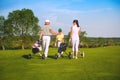 Family playing golf Royalty Free Stock Photo