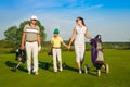 Family playing golf Royalty Free Stock Photo