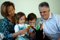 Family playing with hand puppets