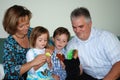 Family playing with hand puppets