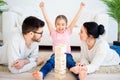 Family playing jenga