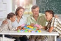 Family playing lego game Royalty Free Stock Photo