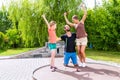 Family playing miniature golf