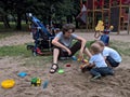 Family playing in the sand Royalty Free Stock Photo