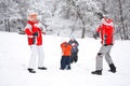 Family playing with snow Royalty Free Stock Photo