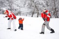 Family playing with snow Royalty Free Stock Photo